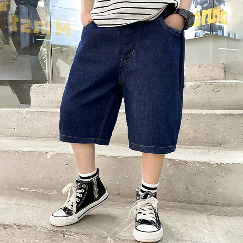 kids lightweight denim shorts elastic waist close up
