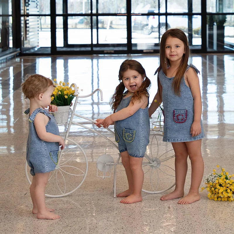 children wearing coordinated denim clothing set
