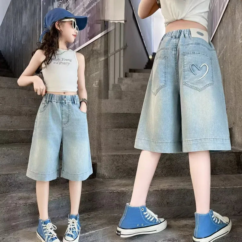 girls wearing heart pattern denim shorts
