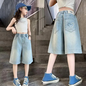 girls wearing heart pattern denim shorts
